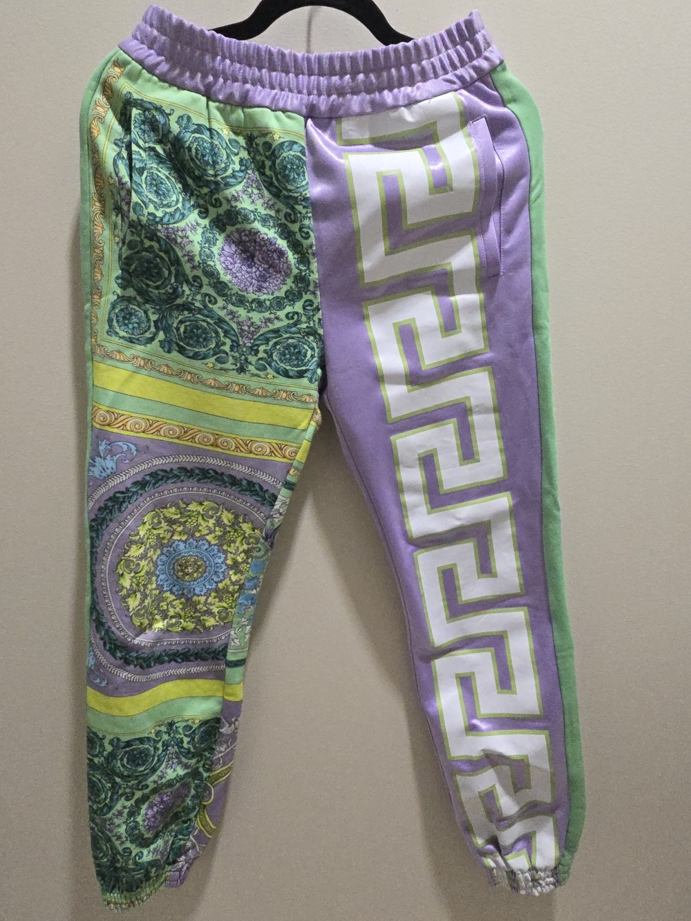 Versace Barocco Mosaic Print joggers in a lilac and green colorway. Size 38